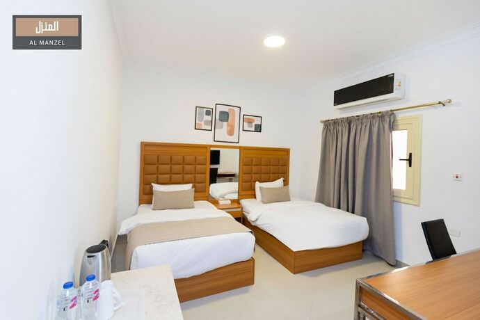 Imagen de la habitación del Hotel Al Manzel Sheikh Zayed. Foto 17