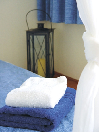 Imagen de la habitación del Hotel Al Mare Villas. Foto 8