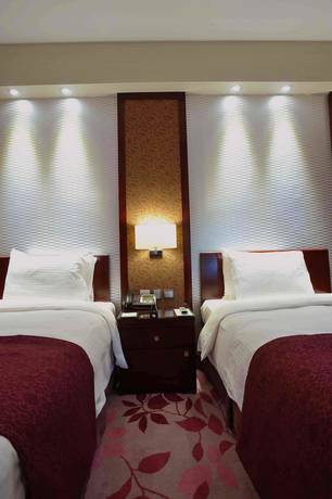 Imagen de la habitación del Hotel Al Marwa Rayhaan By Rotana. Foto 10