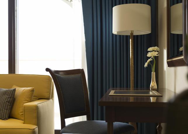 Imagen de la habitación del Hotel Al Najada Doha By Tivoli. Foto 15