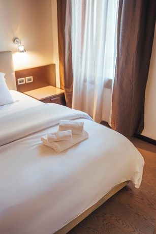 Imagen de la habitación del Hotel Al Paradiso. Foto 8