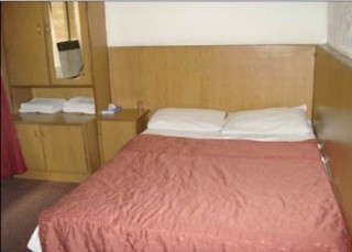 Imagen de la habitación del Hotel Al Patra. Foto 11