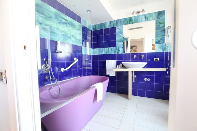 Imagen de la habitación del Hotel Al Porticciolo. Foto 13