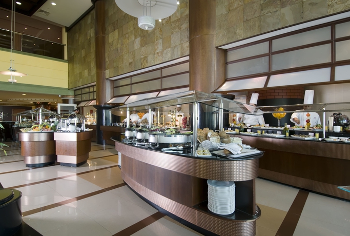 Imagen del bar/restaurante del Hotel Al Raha Beach Resort and Spa. Foto 2