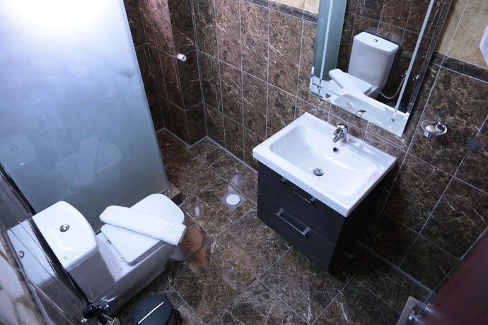 Imagen de la habitación del Hotel Al Sadarah Apartments. Foto 10