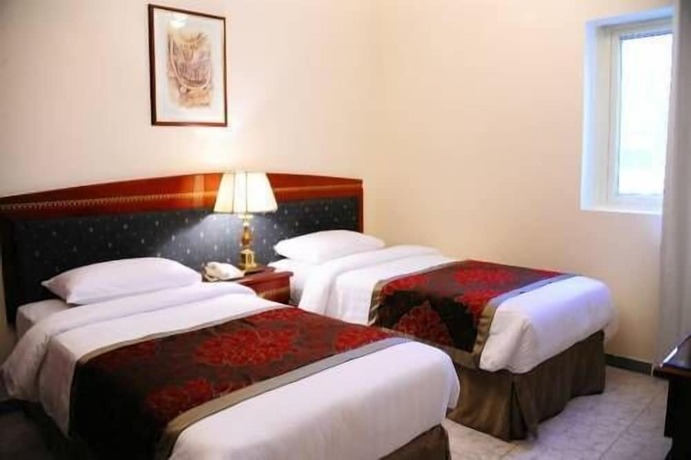 Imagen de la habitación del Hotel Al Sharq Furnished Suites. Foto 17