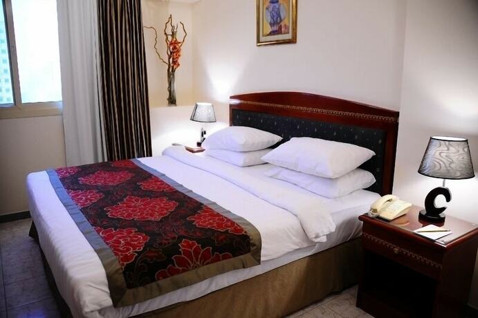 Imagen de la habitación del Hotel Al Sharq Furnished Suites. Foto 19