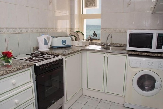 Imagen de la habitación del Hotel Al Sharq Furnished Suites. Foto 20