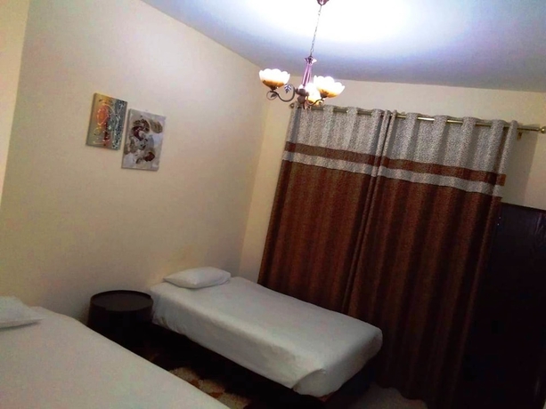 Imagen de la habitación del Hotel Al Smou Apartments. Foto 3