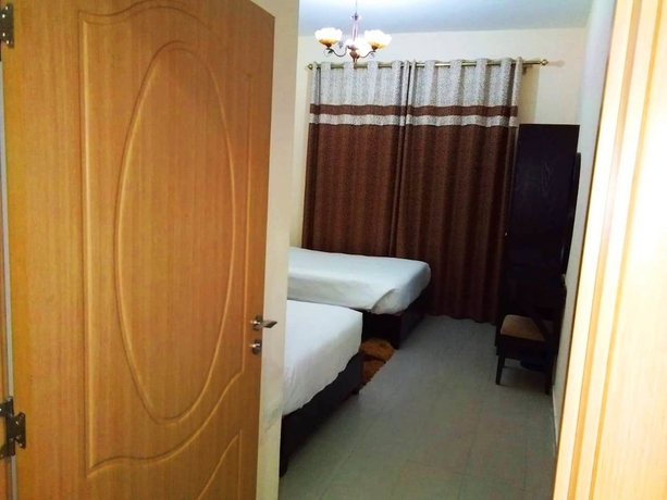 Imagen de la habitación del Hotel Al Smou Apartments. Foto 14