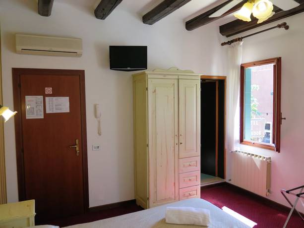 Imagen de la habitación del Hotel Al Soffiador. Foto 11