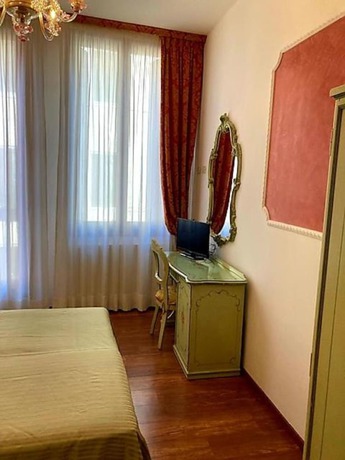 Imagen de la habitación del Hotel Al Sotoportego. Foto 2