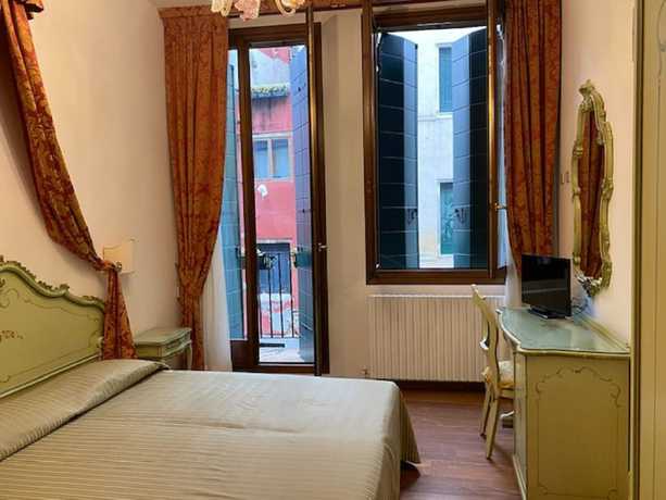 Imagen de la habitación del Hotel Al Sotoportego. Foto 3