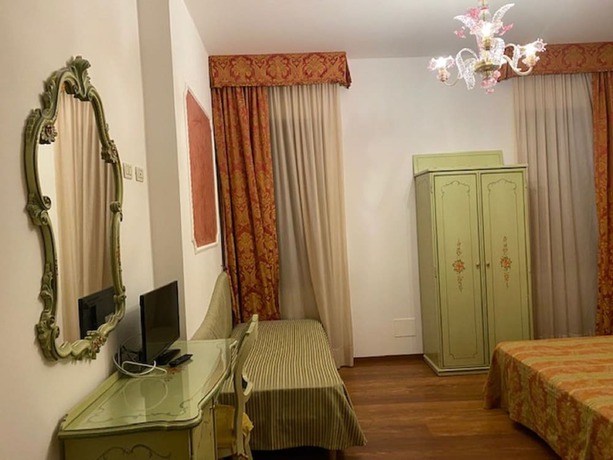 Imagen de la habitación del Hotel Al Sotoportego. Foto 5