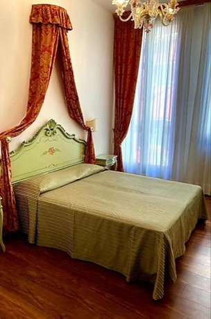 Imagen de la habitación del Hotel Al Sotoportego. Foto 19