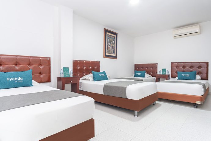 Imagen de la habitación del Hotel Al Super. Foto 2