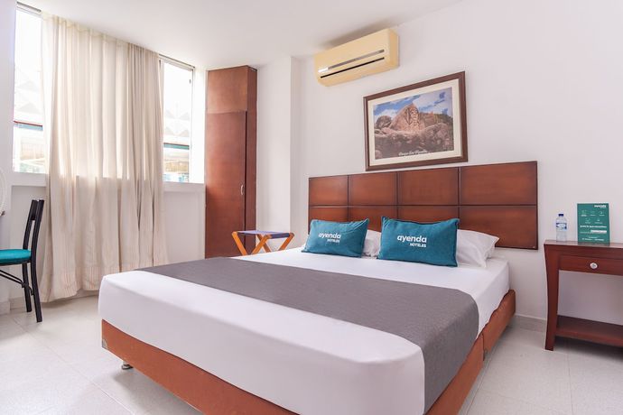 Imagen de la habitación del Hotel Al Super. Foto 12