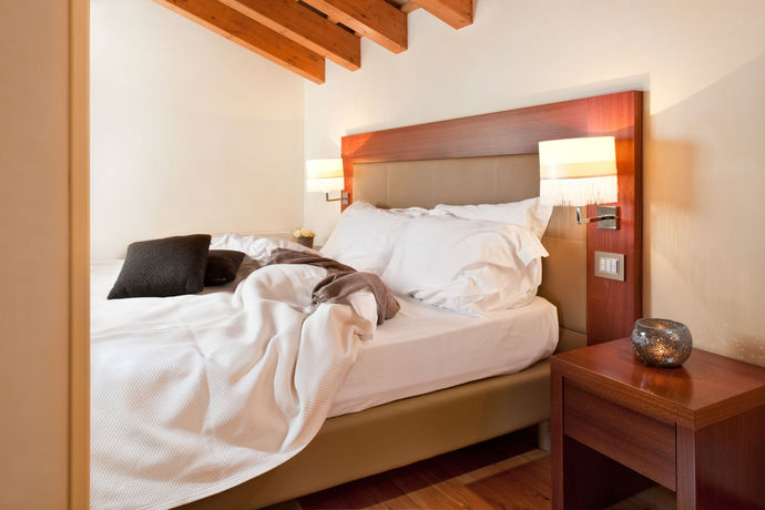 Imagen de la habitación del Hotel Al Tezzon. Foto 13