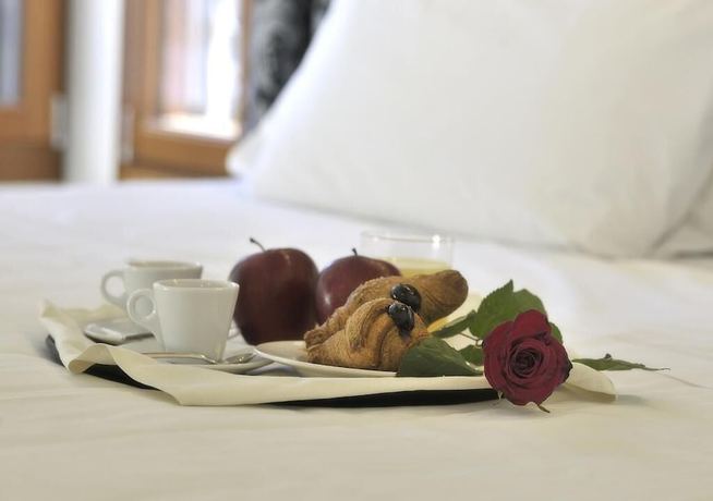 Imagen de la habitación del Hotel Al Theatro Palace. Foto 16