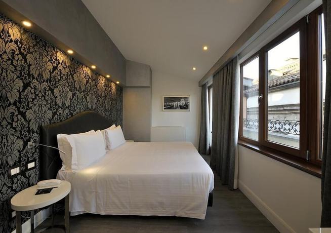 Imagen de la habitación del Hotel Al Theatro Palace. Foto 18