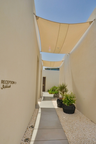 Imagen de la habitación del Hotel Al Zorah Beach Resort. Foto 11