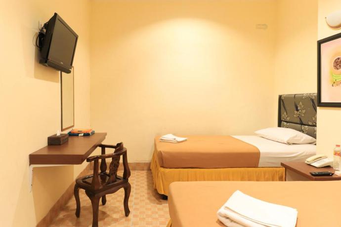 Imagen de la habitación del Hotel Al-Badar Hotel Syariah Makassar. Foto 3