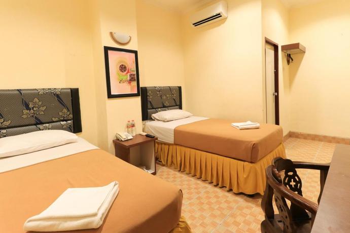 Imagen de la habitación del Hotel Al-Badar Hotel Syariah Makassar. Foto 4