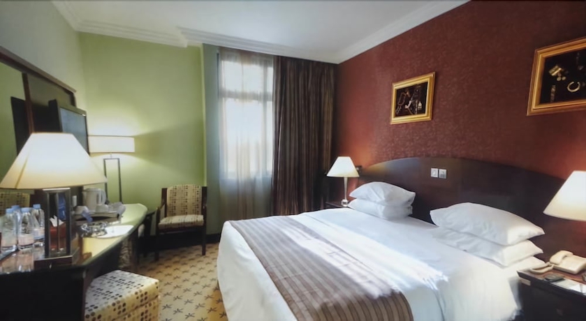 Imagen de la habitación del Hotel Al-Muna Kareem. Foto 9