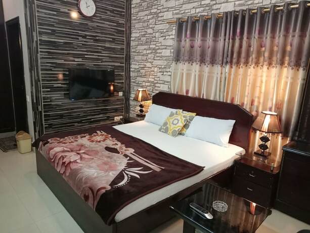 Imagen de la habitación del Hotel Al-Raheem Guest House. Foto 19