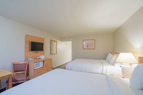 Imagen de la habitación del Hotel Aladdin Inn and Suites. Foto 9