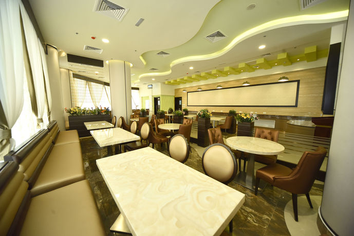 Imagen de la habitación del Hotel Alain Ajman. Foto 4