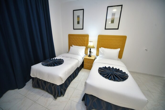 Imagen de la habitación del Hotel Alain Apartments Ajman. Foto 11