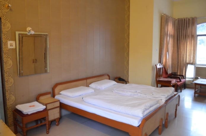 Imagen de la habitación del Hotel Alaknanda. Foto 11