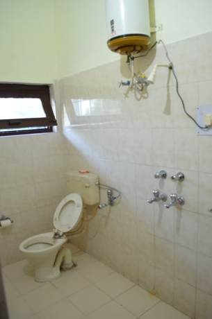 Imagen de la habitación del Hotel Alaknanda. Foto 15
