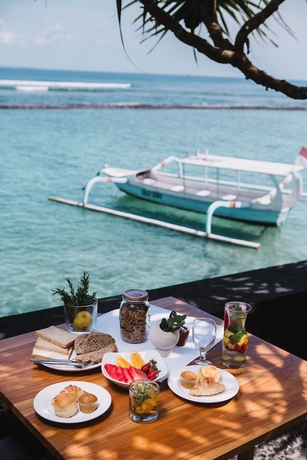 Imagen del bar/restaurante del Hotel Alam Candi Dive Resort. Foto 8