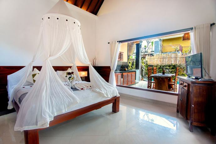 Imagen de la habitación del Hotel Alam Dania Cottage. Foto 3