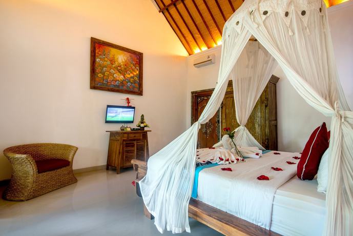 Imagen de la habitación del Hotel Alam Dania Cottage. Foto 7