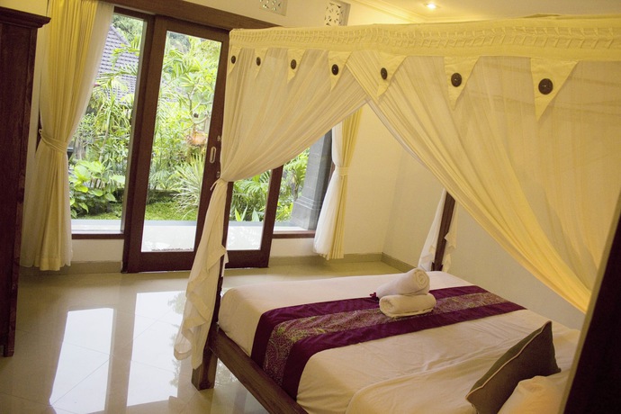 Imagen de la habitación del Hotel Alam Dania Cottage. Foto 9