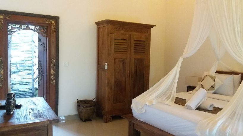 Imagen de la habitación del Hotel Alam Dania Cottage. Foto 10