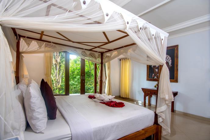 Imagen de la habitación del Hotel Alam Dania Cottage. Foto 14