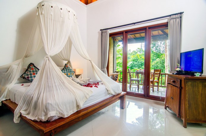Imagen de la habitación del Hotel Alam Dania Cottage. Foto 16