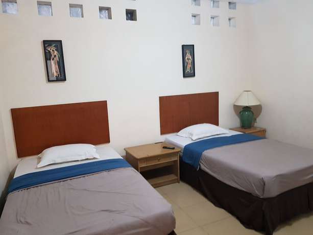 Imagen de la habitación del Hotel Alamanda Garut. Foto 10