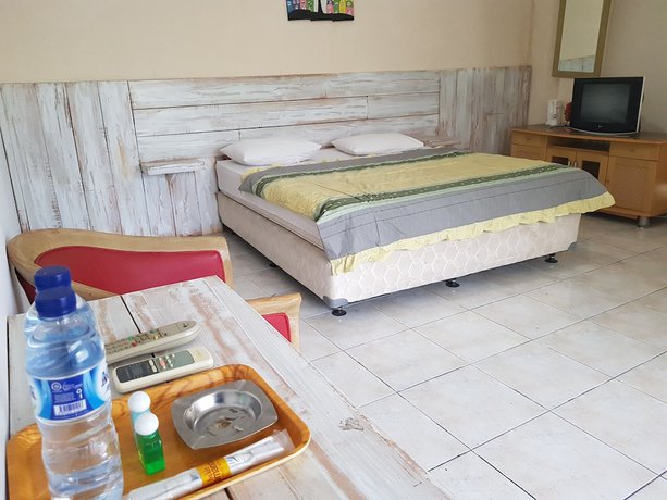 Imagen de la habitación del Hotel Alamanda Garut. Foto 14