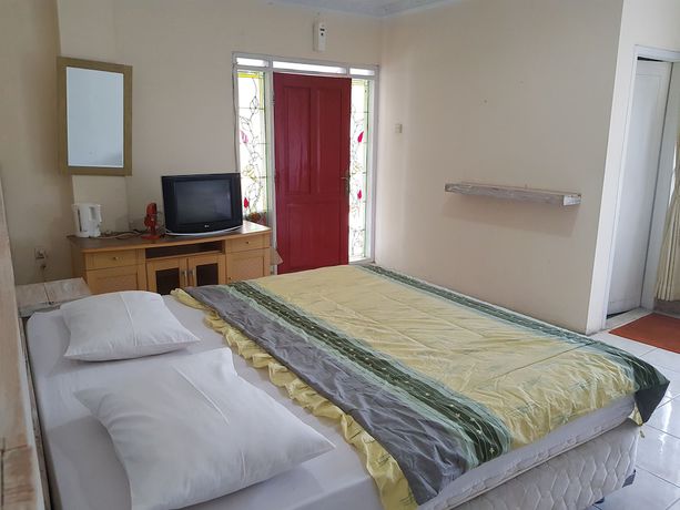Imagen de la habitación del Hotel Alamanda Garut. Foto 15