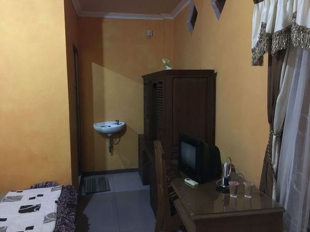 Imagen de la habitación del Hotel Alami near Alun-Alun Klaten. Foto 5