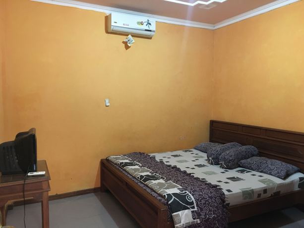 Imagen de la habitación del Hotel Alami near Alun-Alun Klaten. Foto 12