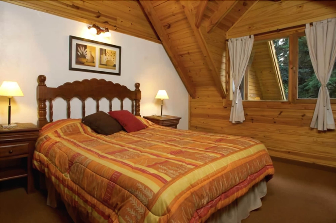 Imagen de la habitación del Hotel Alamos De Meli Tue Caba&ntilde;as. Foto 9