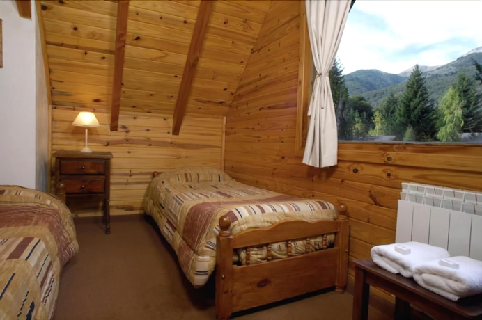 Imagen de la habitación del Hotel Alamos De Meli Tue Caba&ntilde;as. Foto 14