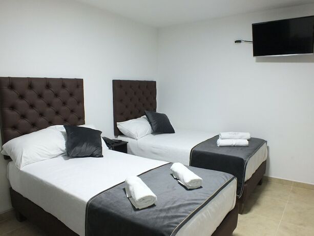 Imagen de la habitación del Hotel Alamos Del Parque. Foto 17