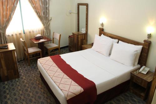 Imagen de la habitación del Hotel Alarraf. Foto 7